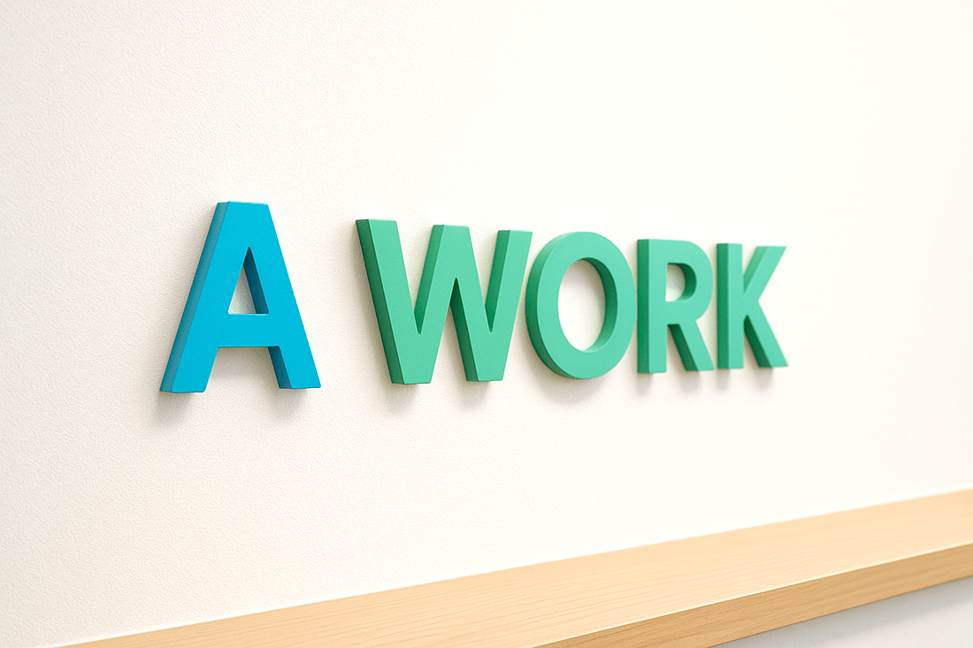 白い壁にカラーのカルプ文字ロゴを浮かせて設置したオフィス受付のイメージ